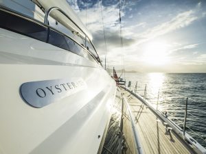 Oyster 125 deck shot with sundown